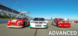 Three stock cars at Pocono Raceway