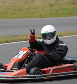 Go-cart Driver Giving Peace Sign